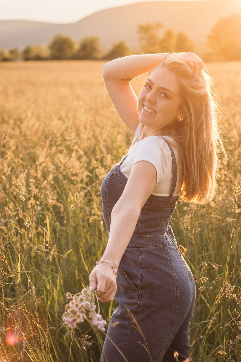 Frolicking in a wildflower field at golden hour sunset