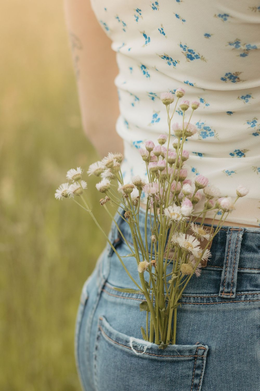 Frolicking in a wildflower field at golden hour sunset