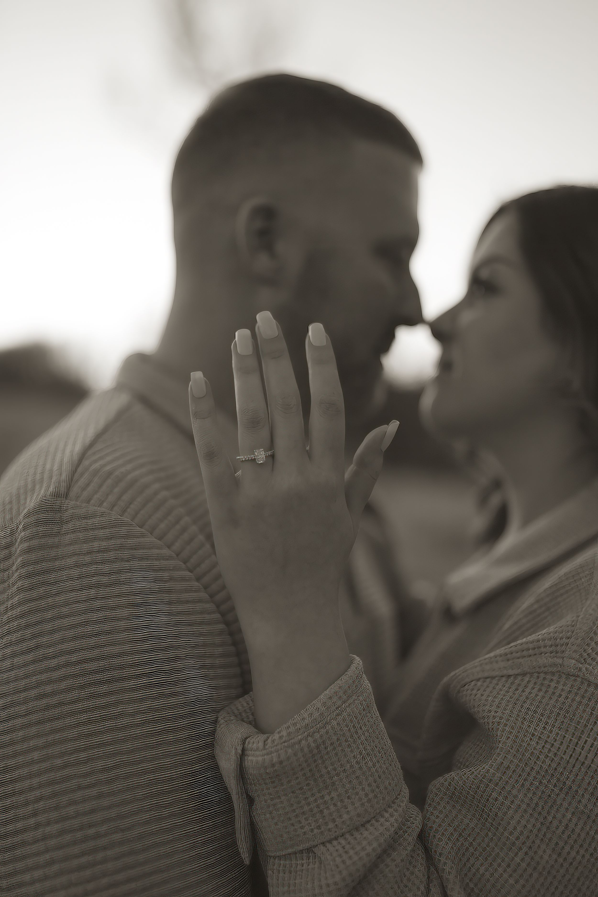 A soft focus sequence showing an intimate couple's moment in black and white.