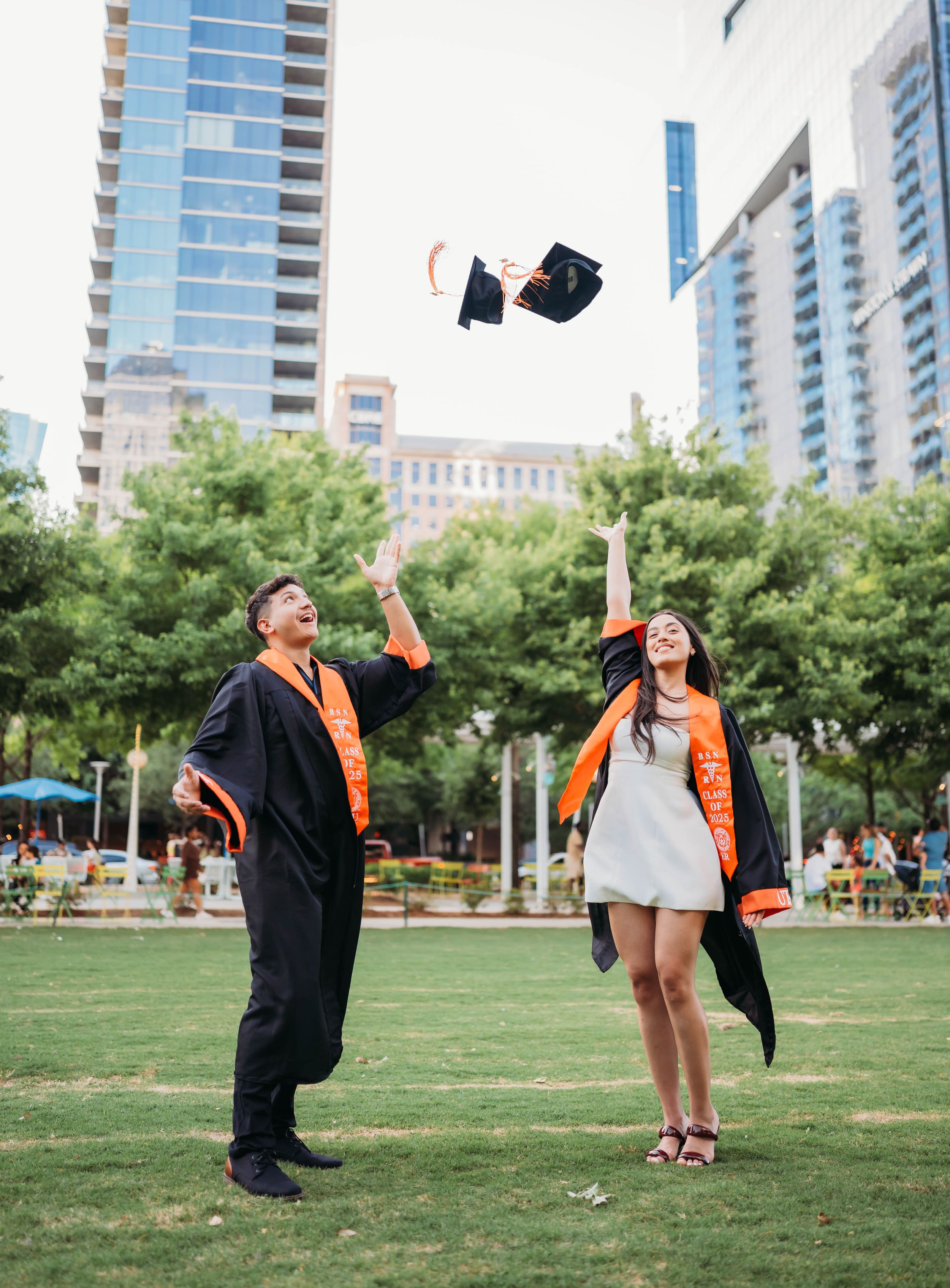 A series of photos shows two people playing together on a green lawn in front of urban buildings.