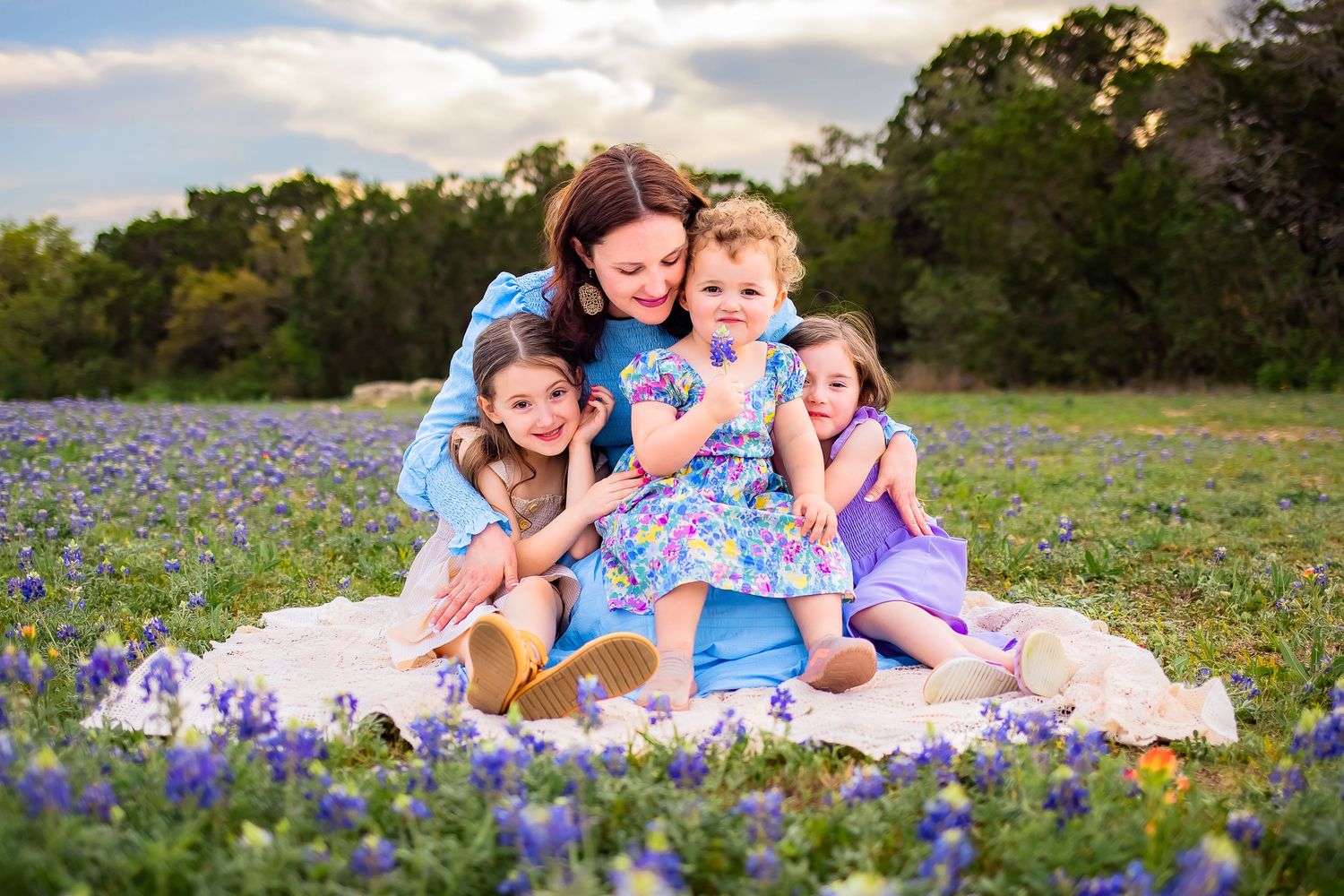 Beautiful San Antonio family moment in the iconic Texas bluebonnets.