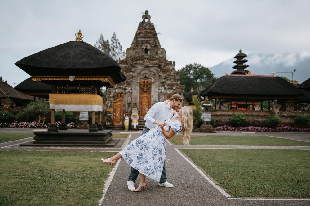 Dancing together at historic temple grounds in Bali.