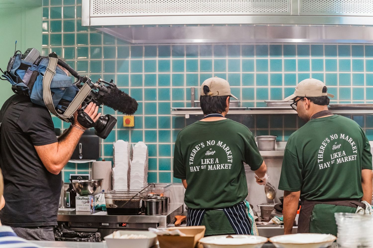 Filming staff cooking in Hay St market, Sydney.