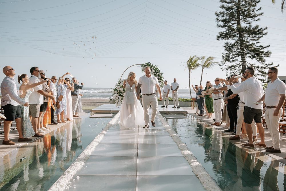 A montage of wedding party photos shows people gathered around a pool during an elegant outdoor celebration.