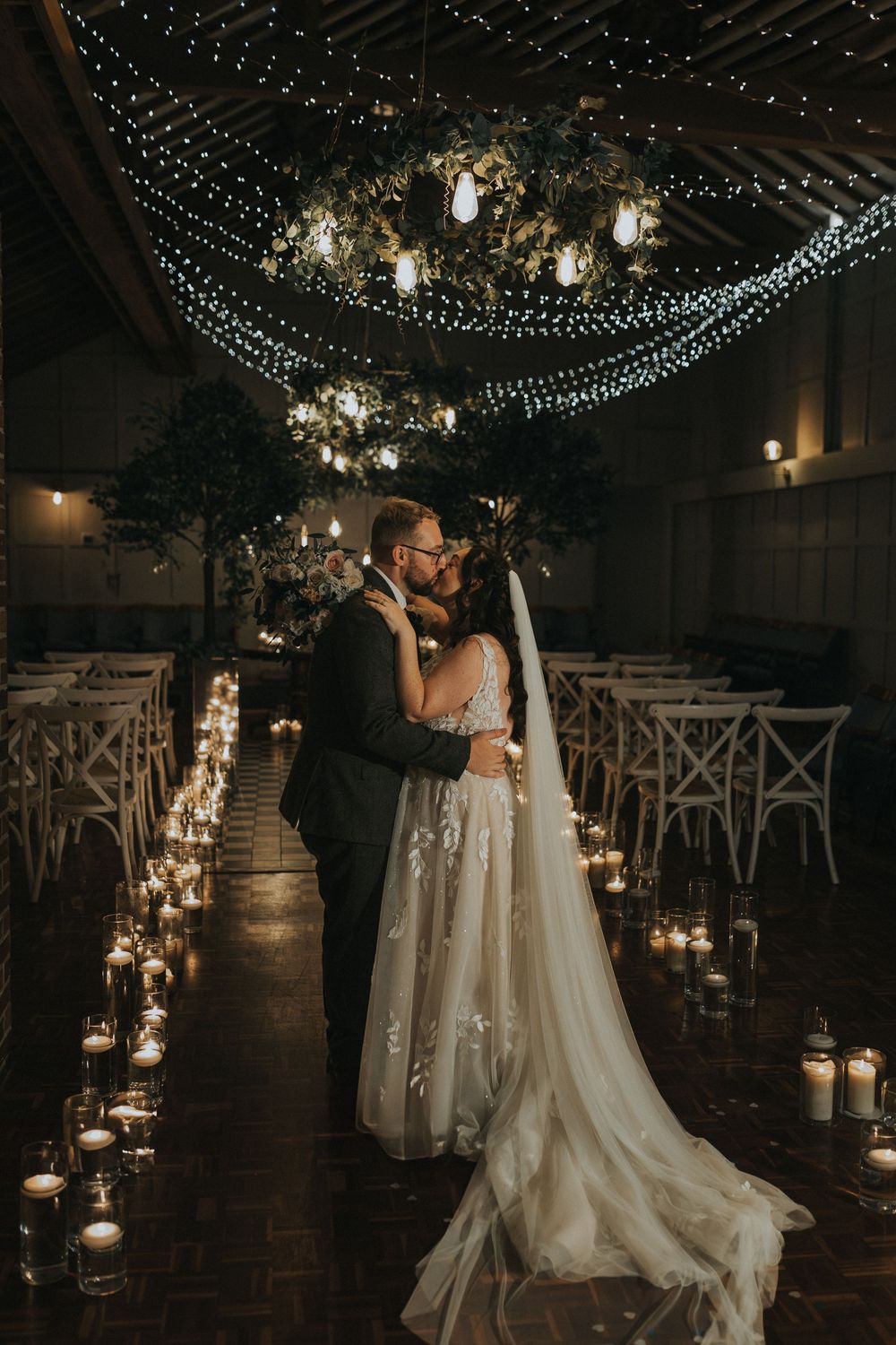 Larkspur lodge wedding photography bride groom ceremony room kiss candles