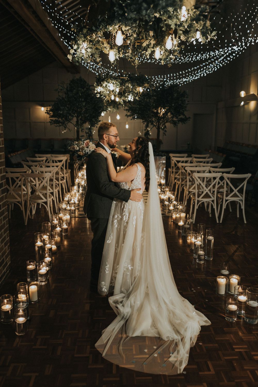 Larkspur lodge wedding photography bride groom ceremony room kiss candles