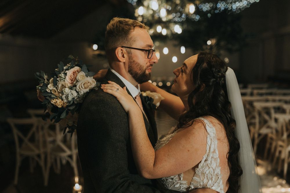 Larkspur lodge wedding photography bride groom ceremony room kiss candles