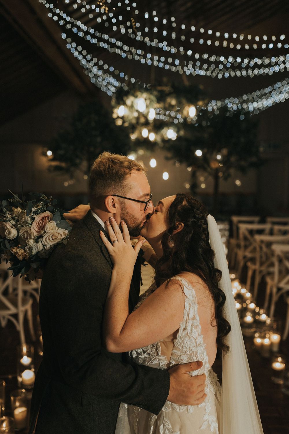 Larkspur lodge wedding photography bride groom ceremony room kiss candles
