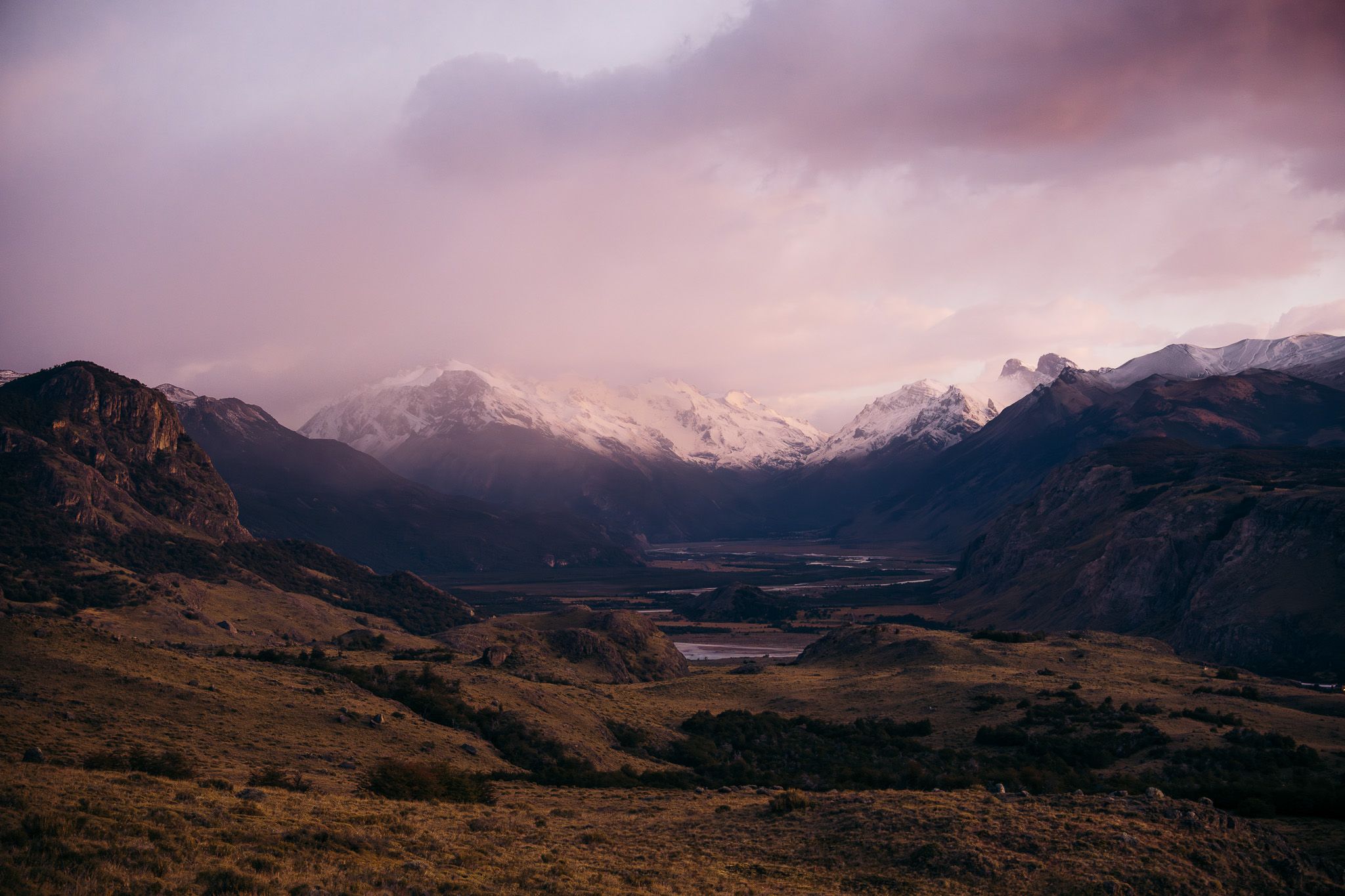 Panoramic sequence of dramatic mountain landscapes at sunset with snow-capped peaks and misty valleys.