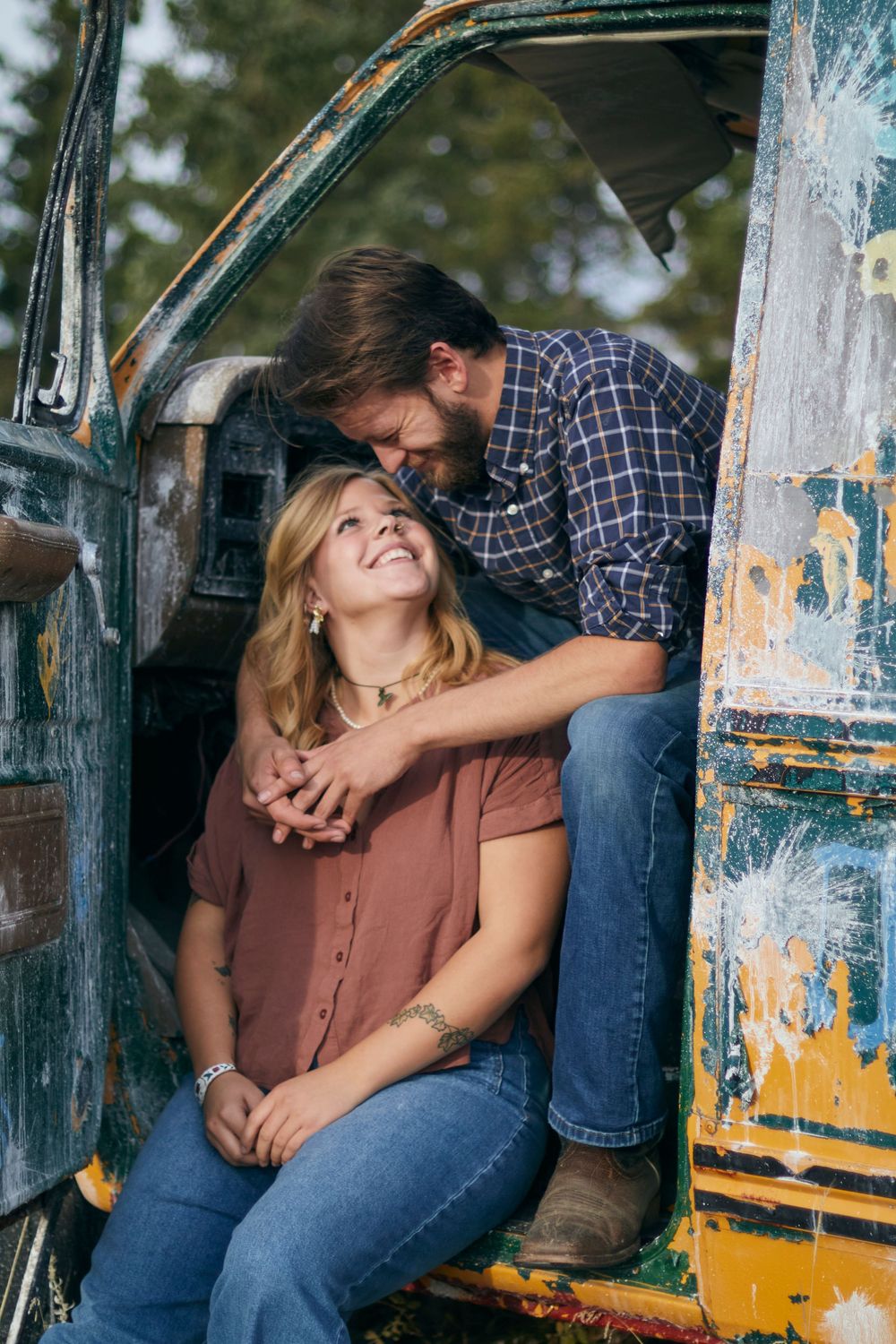 Couple photoshoot in a paintball bus with soft lighting. pinterest worthy