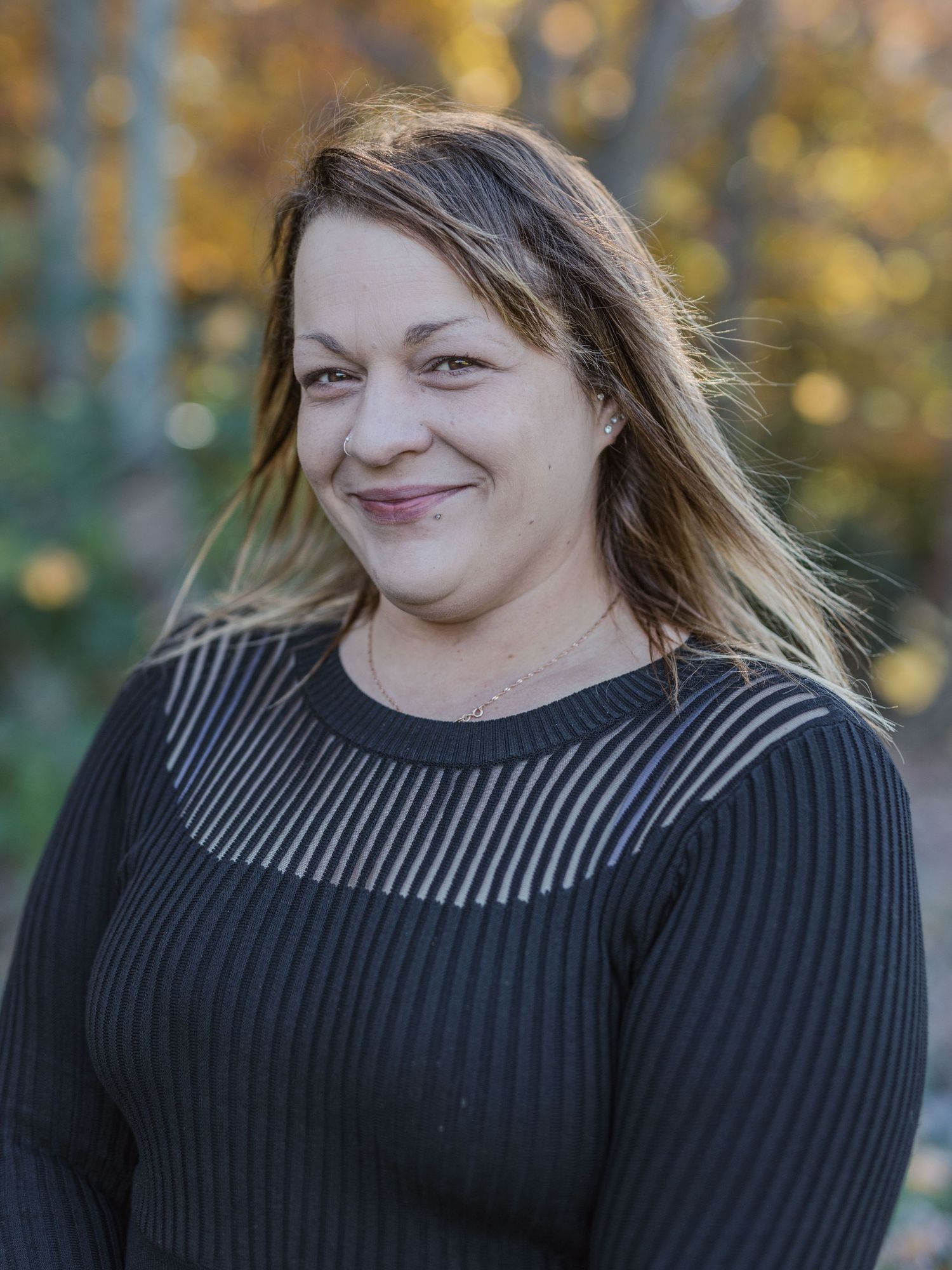 Windsor Ontario outdoor headshot with rich autumn colors by Tasha Cannaday Photography.