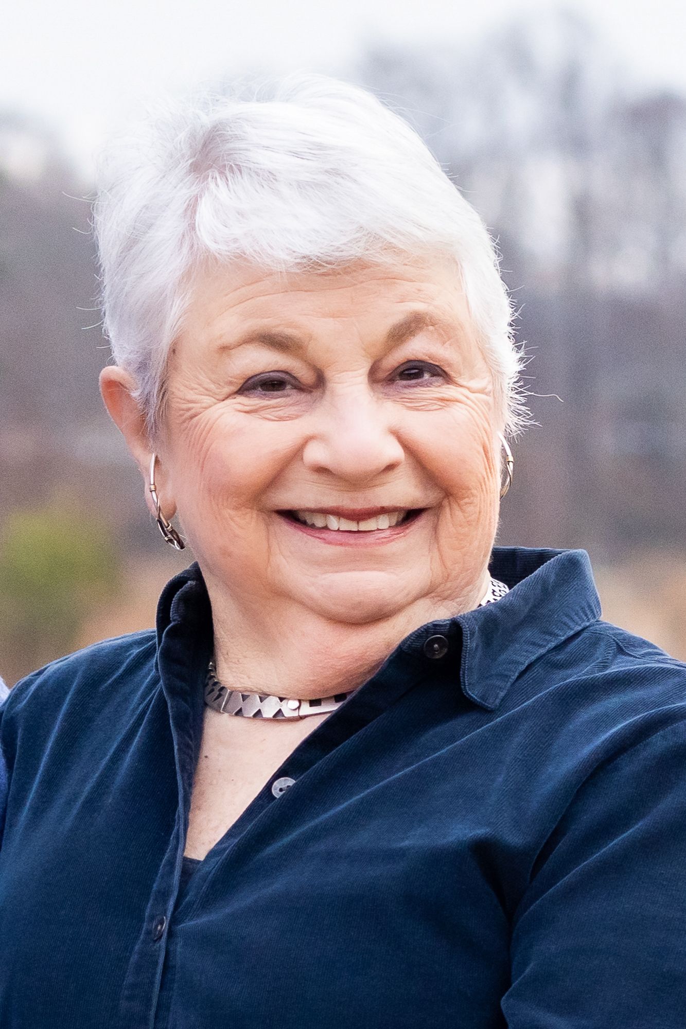Casual outdoor headshot in golden hour light, Amherstburg professional photo.