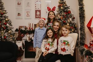 A festive holiday photo collage showing multiple Christmas scenes with decorated trees and holiday decor in the background.
