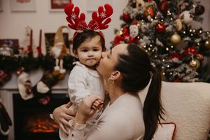 Festive Christmas collage showing intimate family moments with decorations and holiday cheer in a cozy home setting.