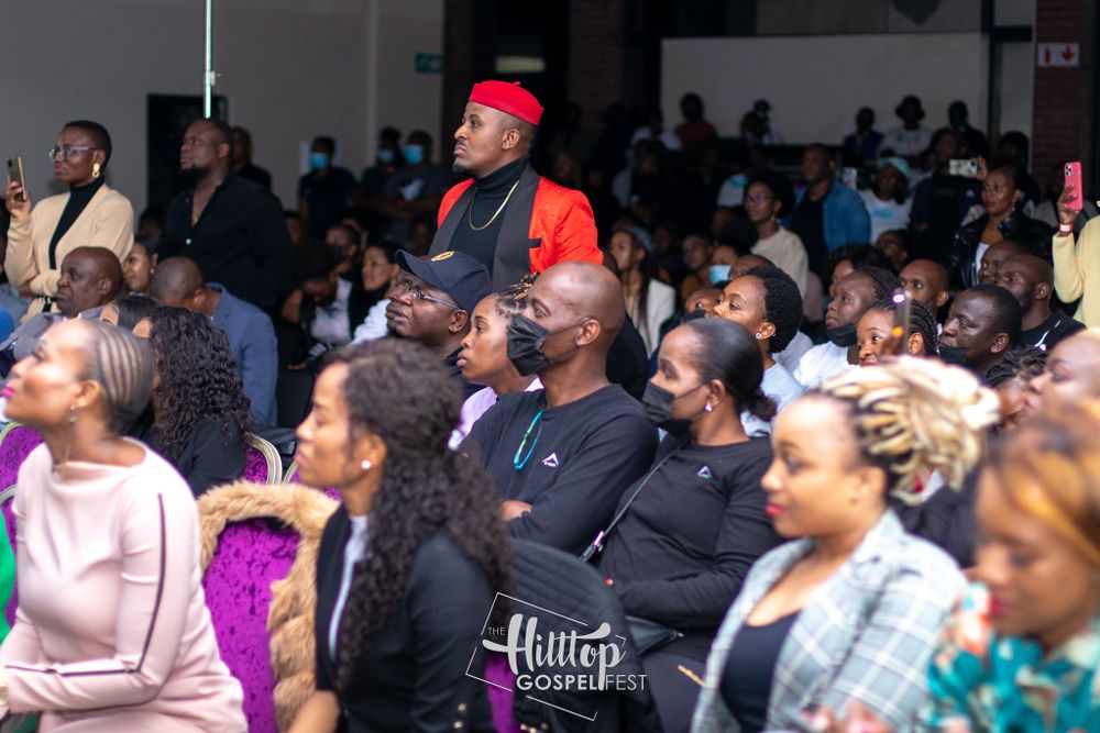 An engaged audience watches intently during a live performance event.