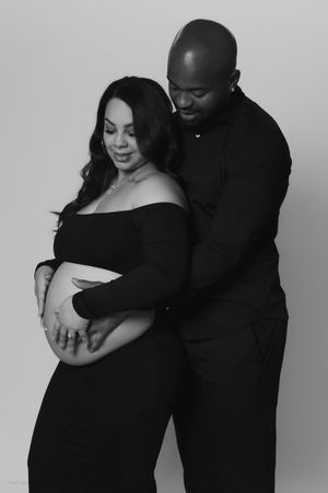 woman posing during a maternity portrait session in Pittsburgh by Camille Cupid Photography, natural editorial maternity photographer near m