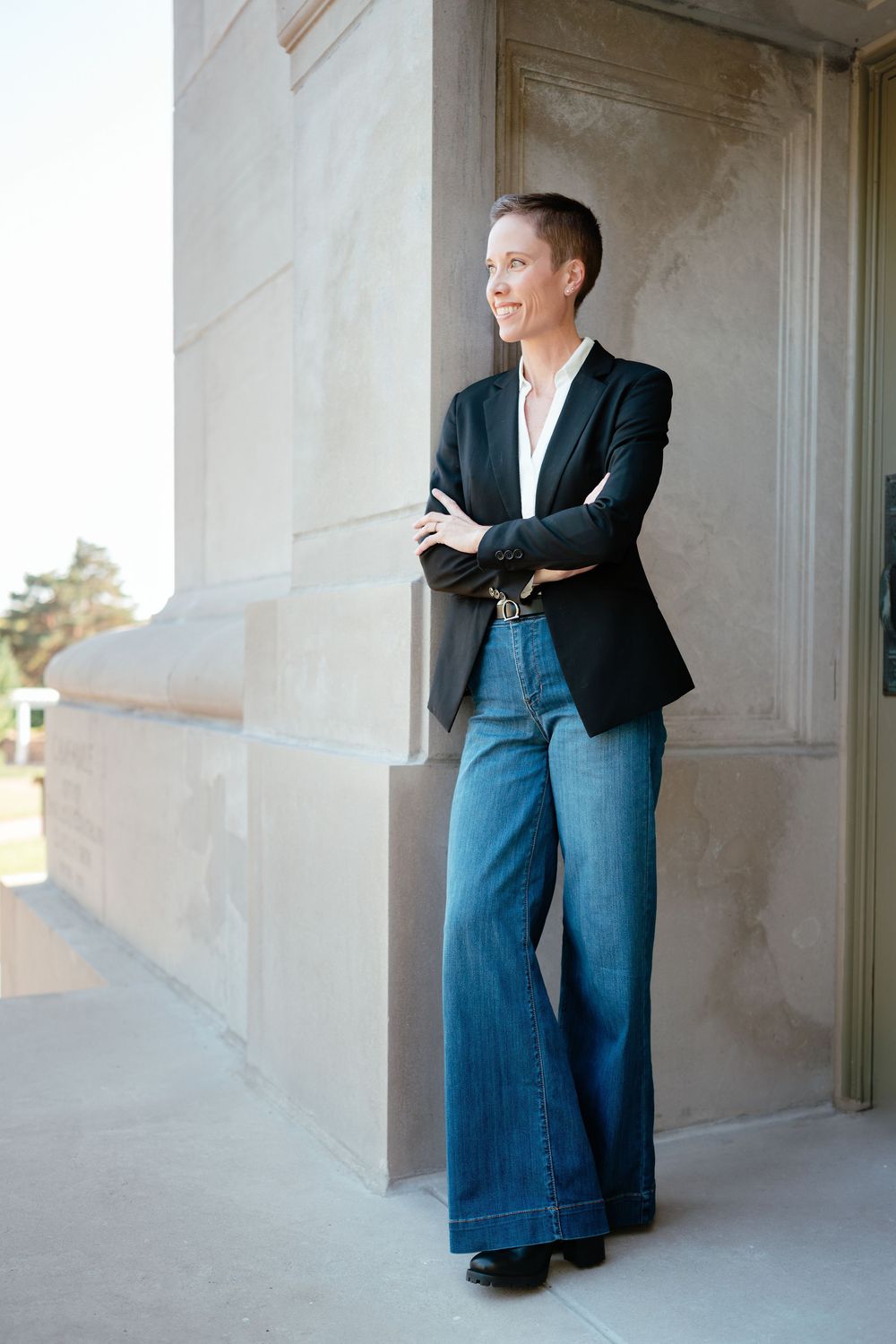 Professional headshot of a business woman with natural light and clean editing in Brookings, SD.