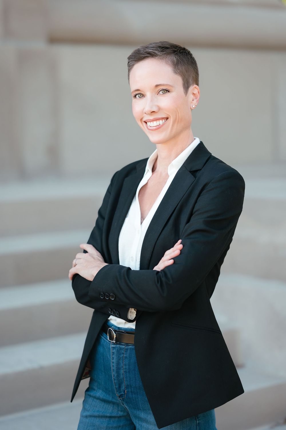 Clean outdoor headshot of a professional woman in Brookings with natural light.