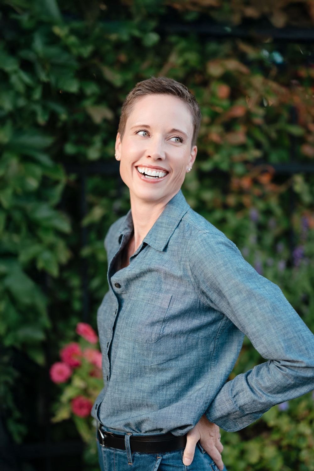 Professional headshot of a business woman with natural light and clean editing in Brookings, SD.