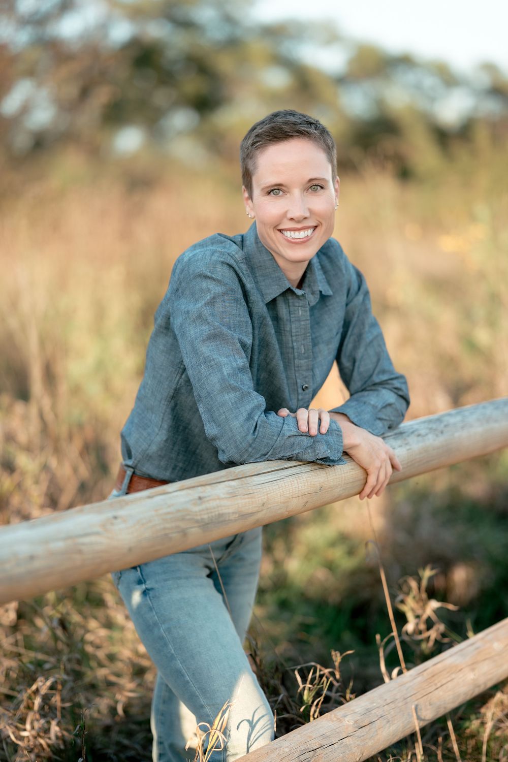 Professional headshot of a business woman with natural light and clean editing in Brookings, SD.