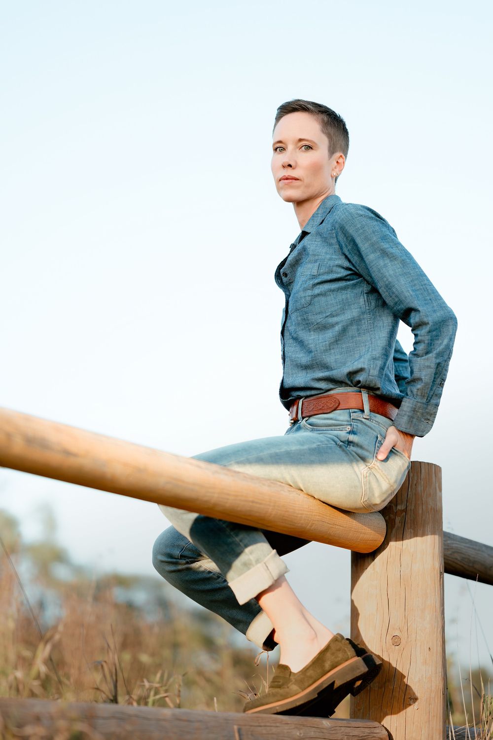 Professional headshot of a business woman with natural light and clean editing in Brookings, SD.