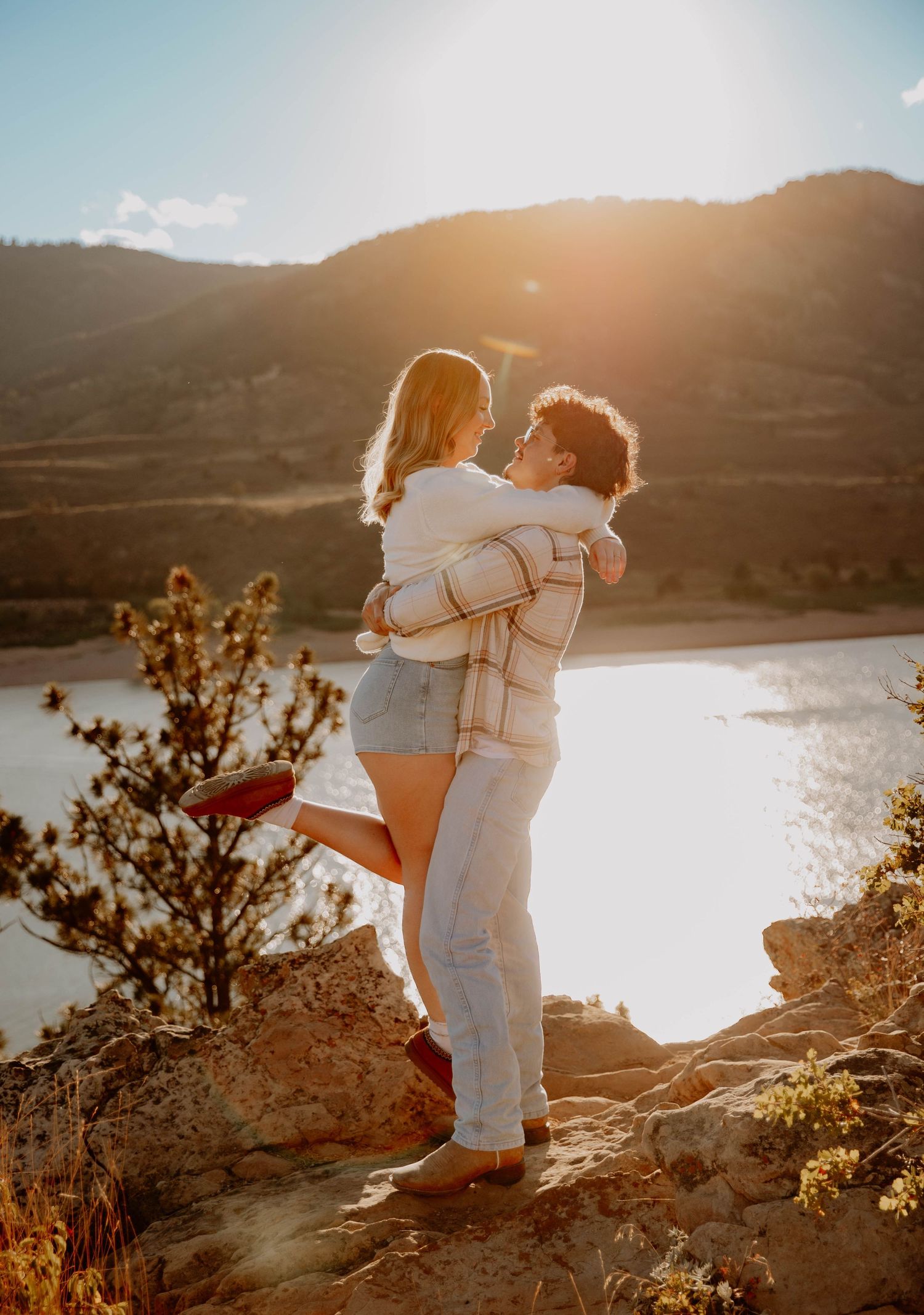 Colorado couple poses for photos and engagement photos and elopement and cinematic photos in Fort Collins, Colorado from photographer