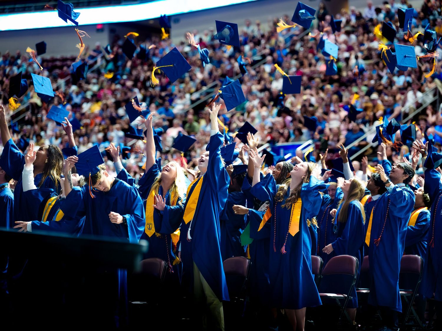 Hershey High School graduates toss their caps at commencement, by Deanna Fox, SportsFox Photography based in Hershey PA