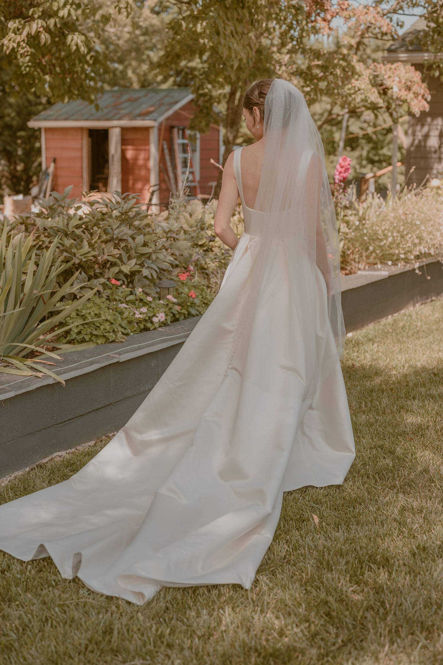 Bride portraits at Heritage Hill B&B, Waynesboro, VA, candid film flowing white wedding dress with a long train