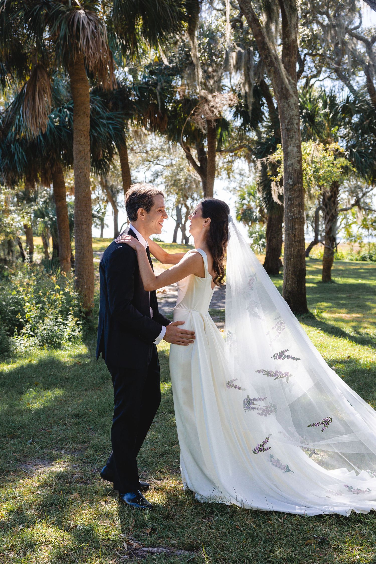 Romantic outdoor wedding photography sequence showing couple in formal attire posing among trees in natural sunlight.