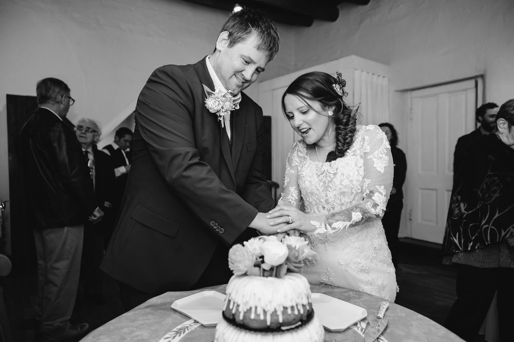 Black and white photo collage showing wedding reception moments including cake cutting and celebration scenes.