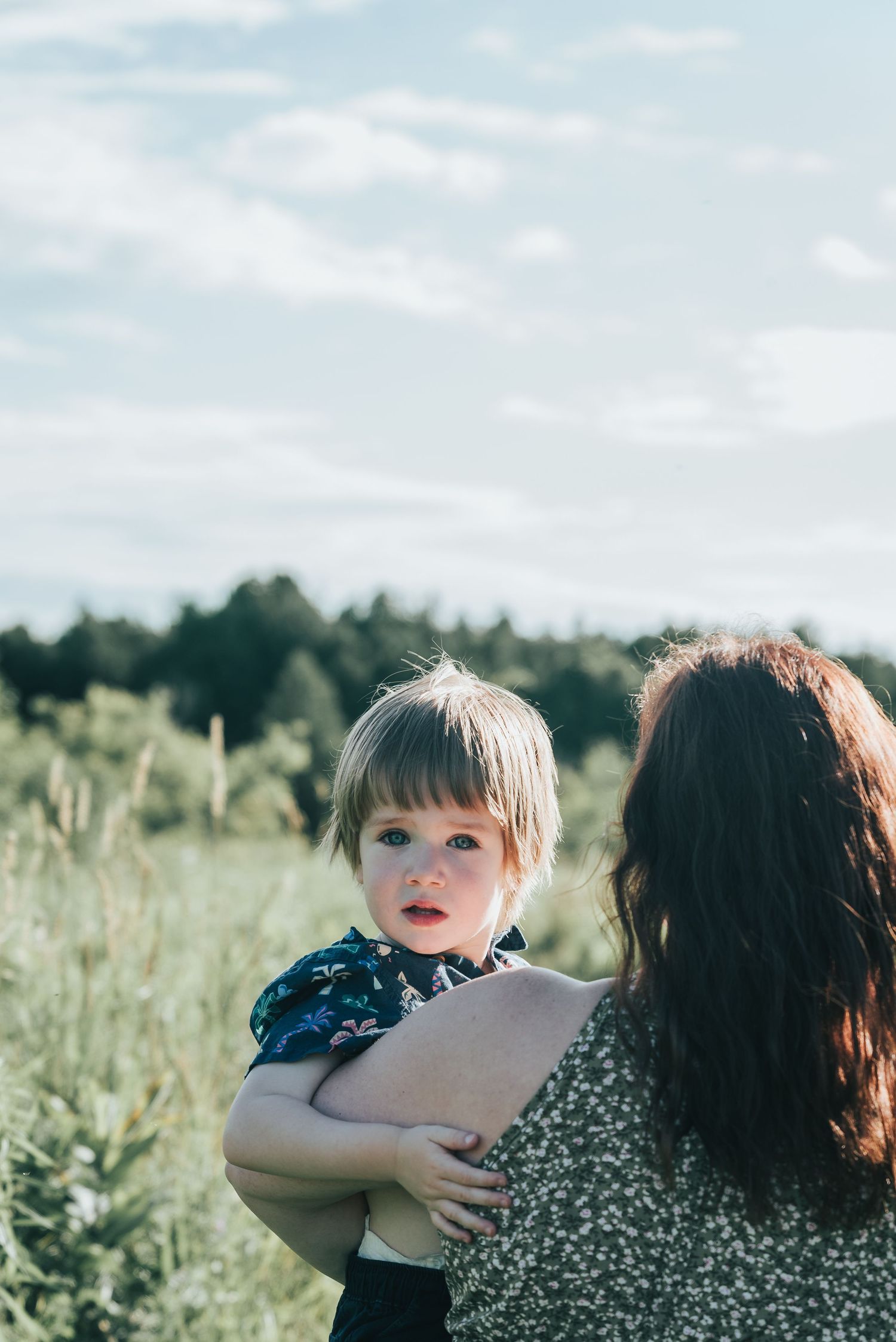 Parents and children walking together during family photography session.
