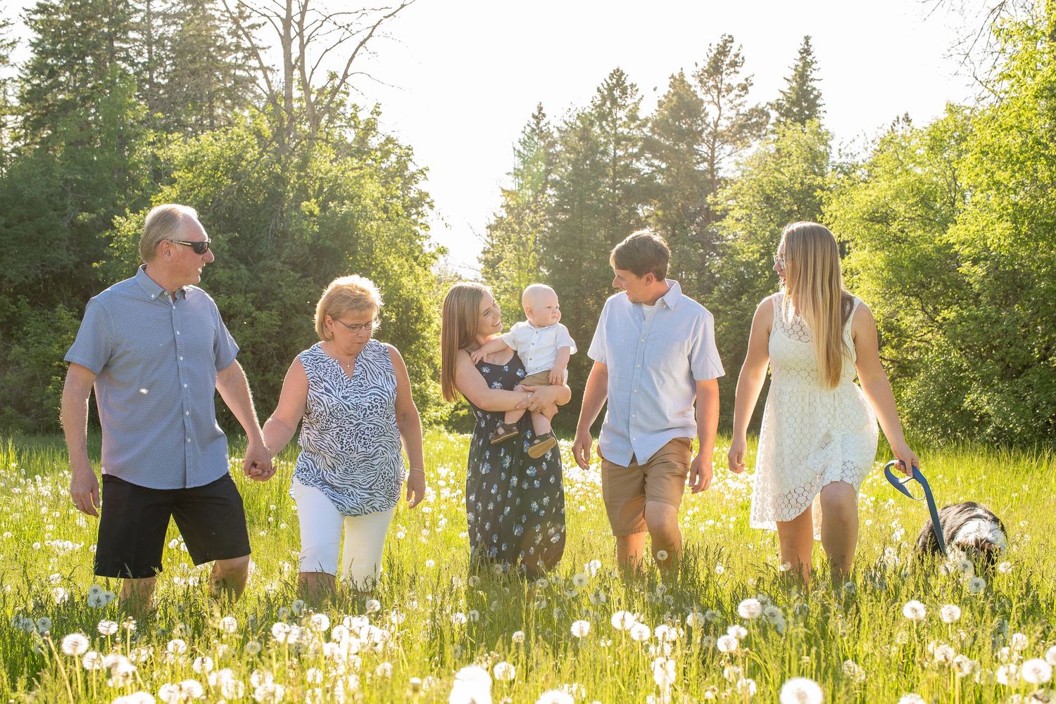 Outdoor family photography session during golden hour.
