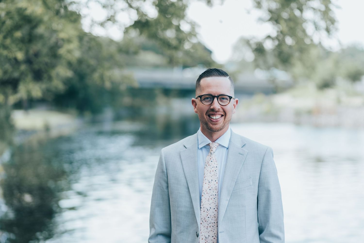 Modern professional headshot with natural expression.