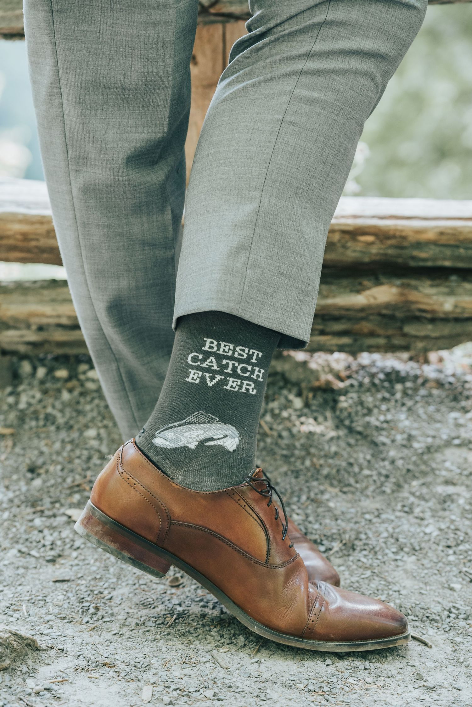Candid details photographed of the groom on the wedding day in natural light.