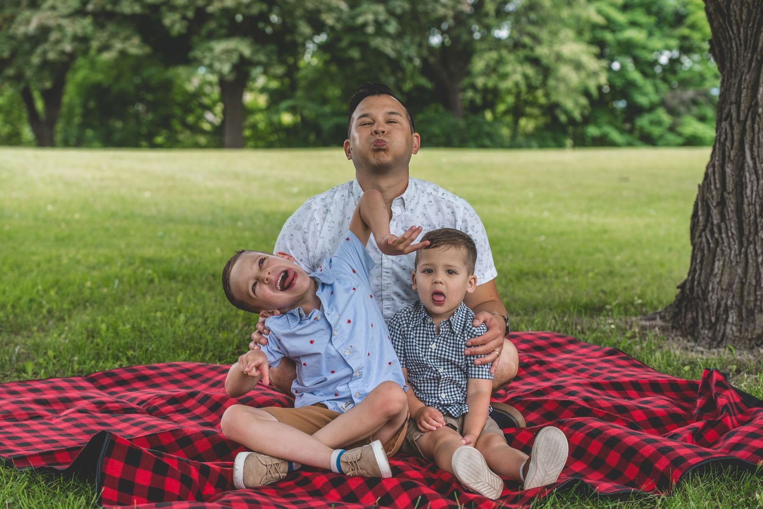 Candid family photography showing joyful moment between parent and child.
