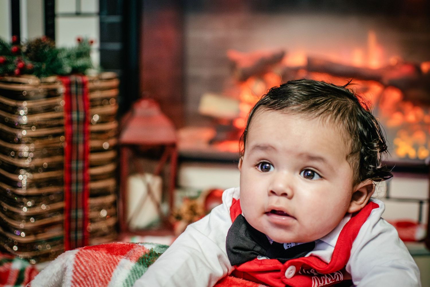 Four-month-old baby boy photographed during a cozy Christmas photo session in Puyallup.