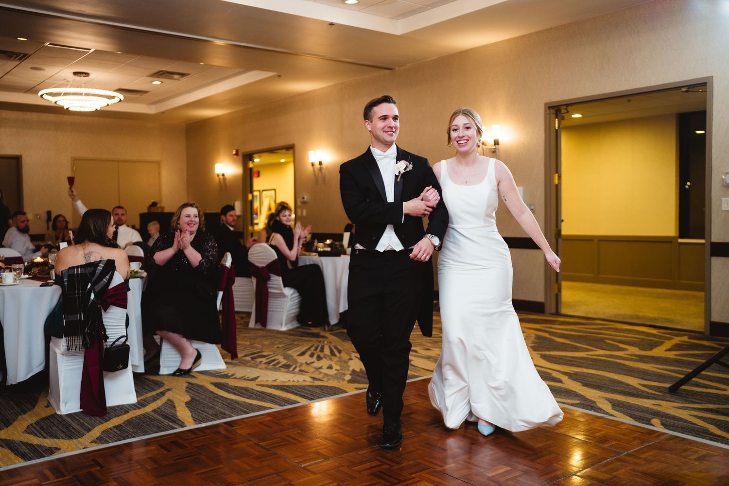 A series of five wedding reception photos showing dance moves and celebration on a hotel ballroom dance floor.
