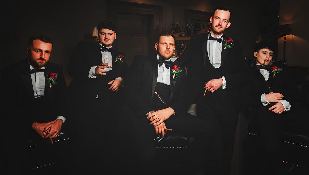 Five formal black and white tuxedo photos arranged in a horizontal filmstrip sequence.
