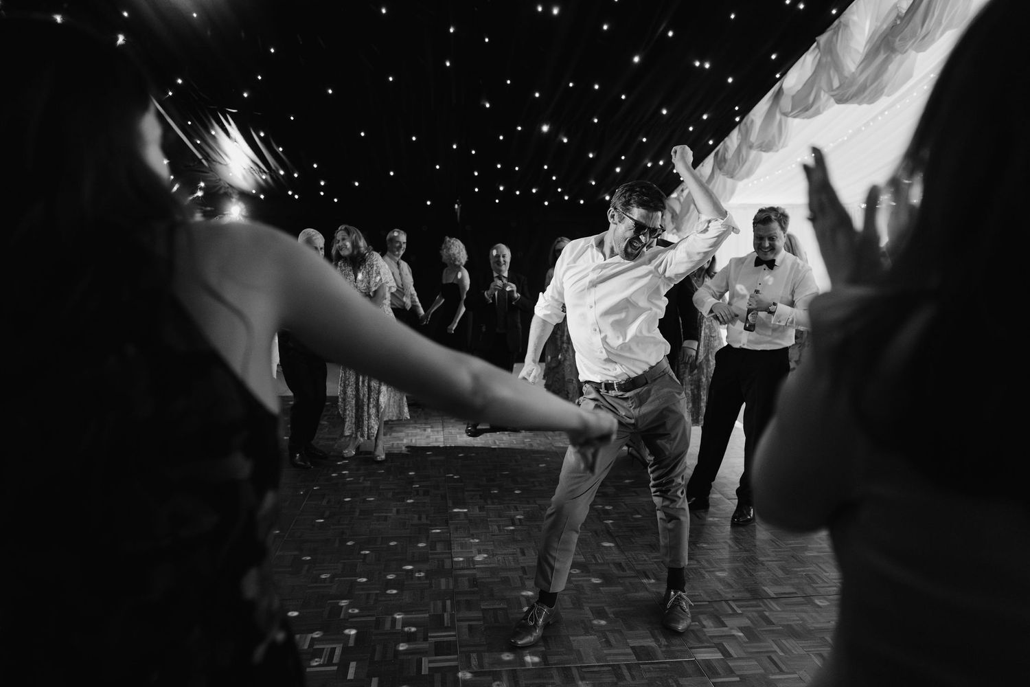 wedding guests dancing on dance floor at hamswell house wedding in bath