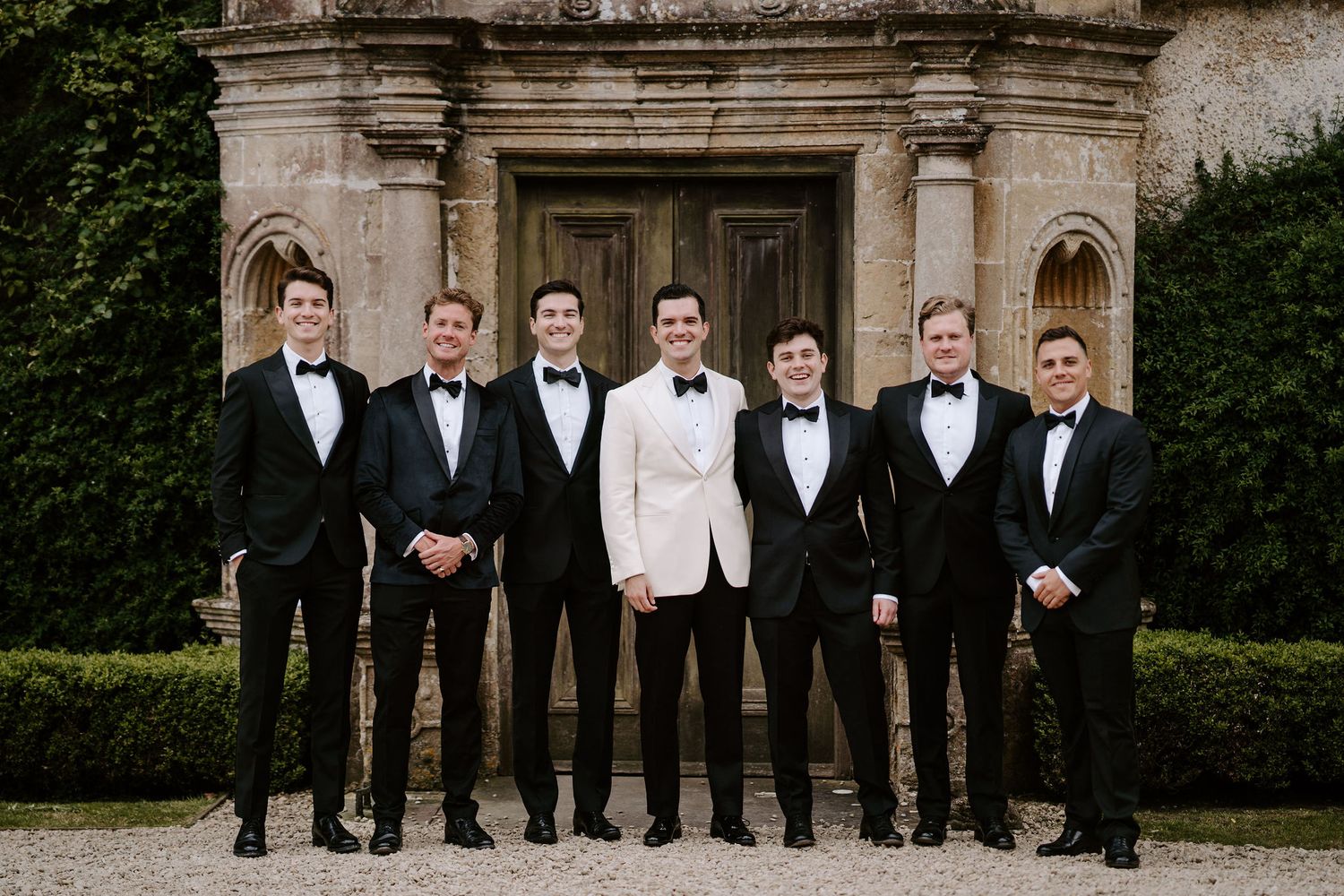 groom and groomsmen outside Hamswell house in bath