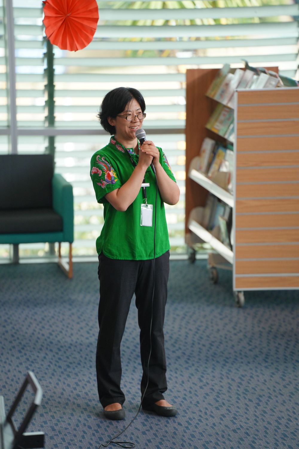 Library New Year event photography featuring a beautiful traditional Hanfu Guzheng performance, by an Auckland photographer.