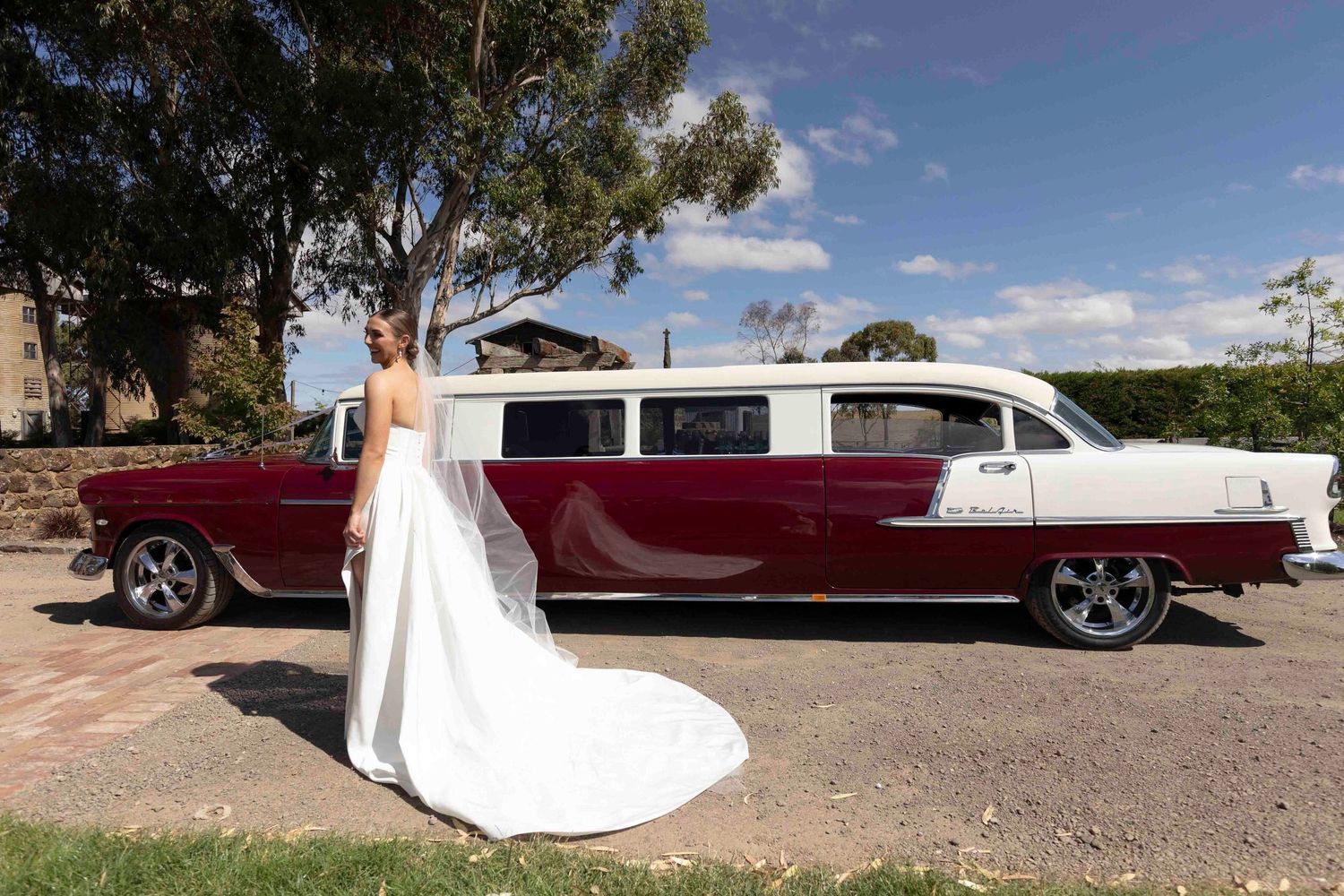 Bride outside of car at Warrawong Estate, Victoria