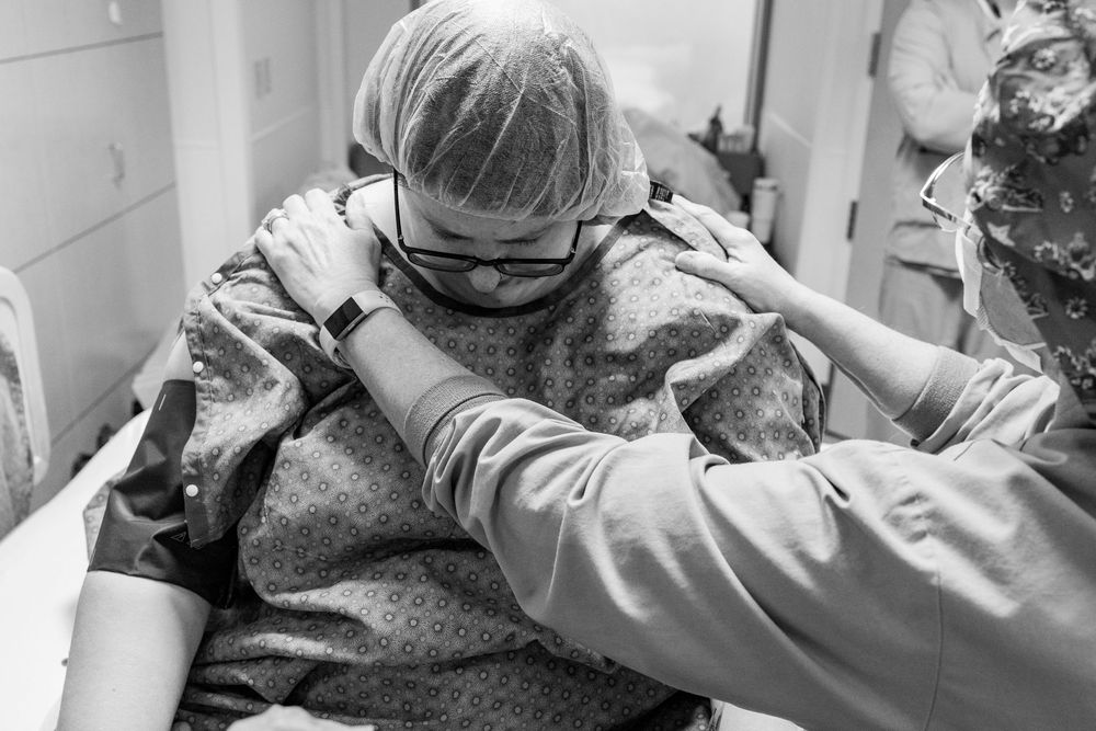 Healthcare professionals providing patient care in a medical setting.