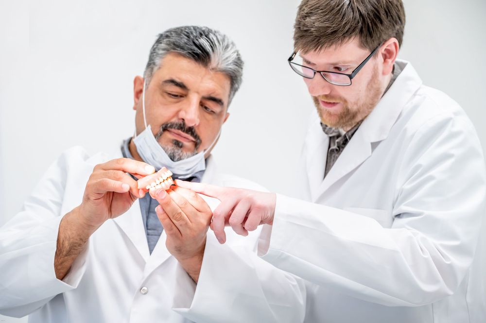 Professionelles Gruppenfoto von Zahntechnikern, Businessfotografie für Labor und Praxis in Gelsenkirchen.
