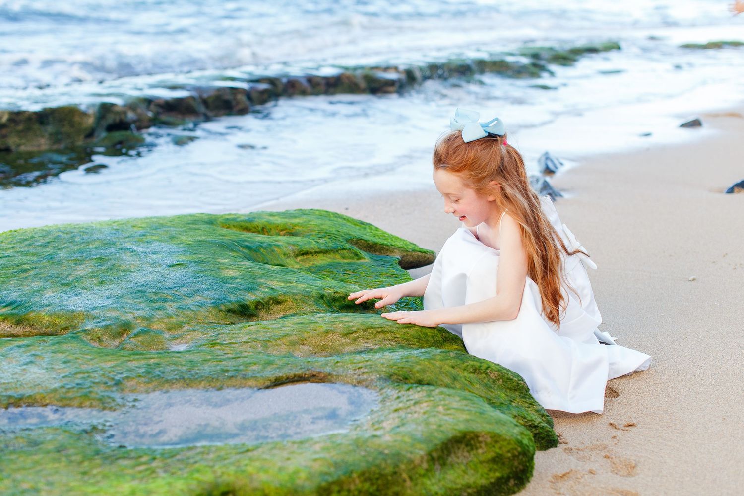 Portrait of a girl on the beach. San Juan, Puerto Rico.