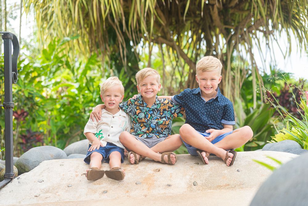 A series of casual outdoor family photos arranged in a horizontal strip showing people sitting and interacting together.