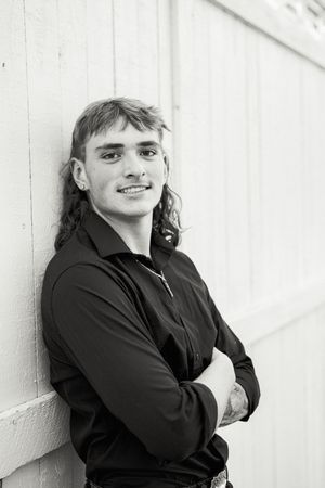 Casual portrait series against white wall showing relaxed expressions.