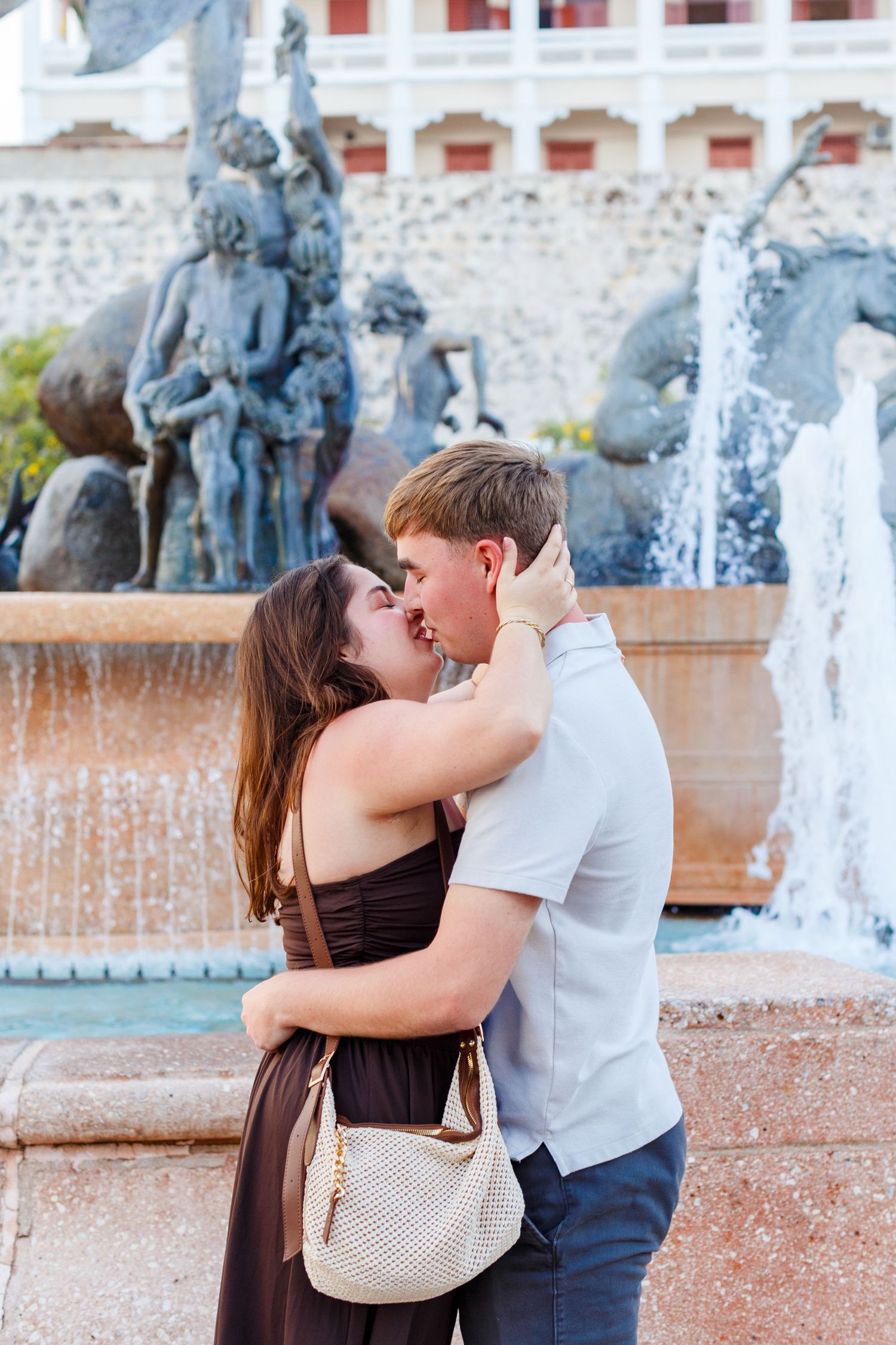 Couples portrait. Marriage proposal at Fuente Raíces in Old San Juan, Puerto Rico.