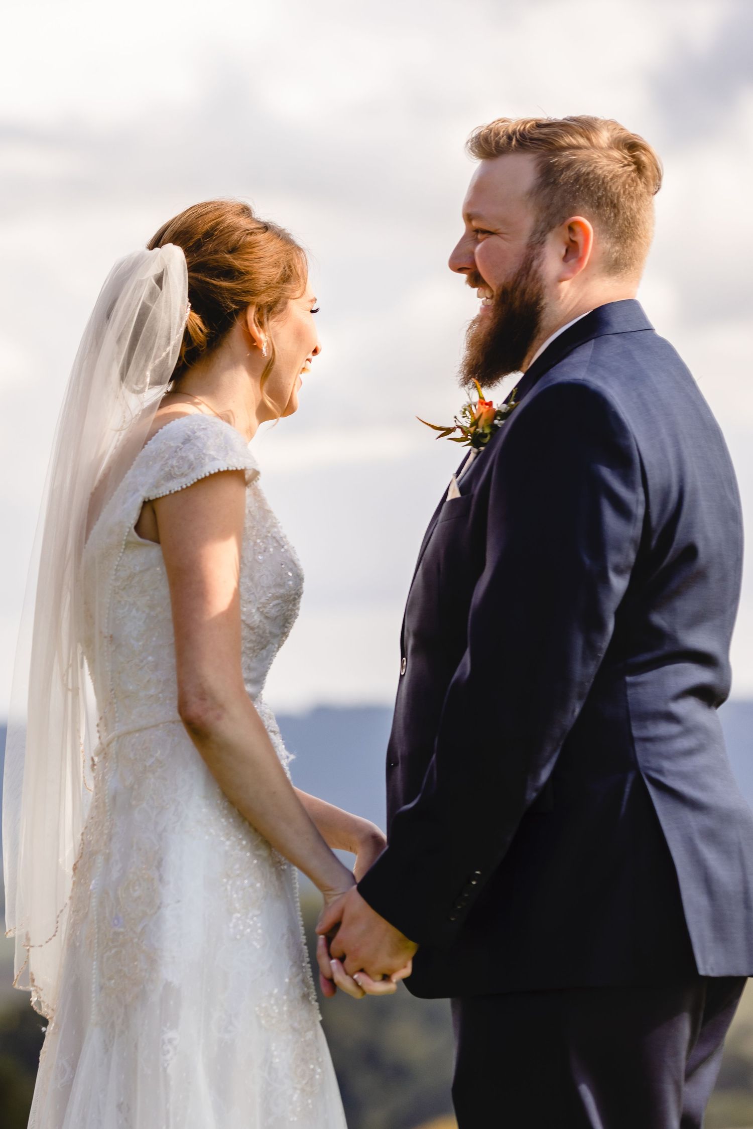 A bride and groom share an intimate moment during their mountain wedding ceremony in three sequential photos.