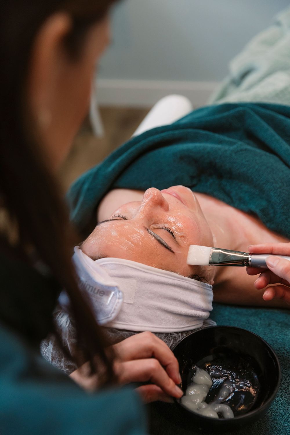 Professional spa treatment being performed with specialized tools.
